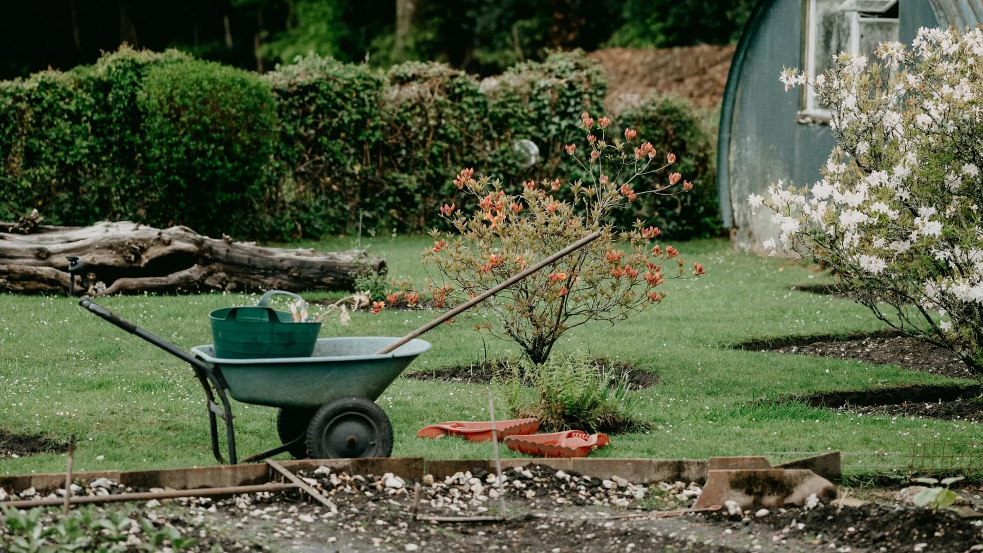 a wheel barrow for maintaining a landscaped garden